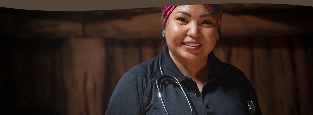 Health practitioner with stethoscope.